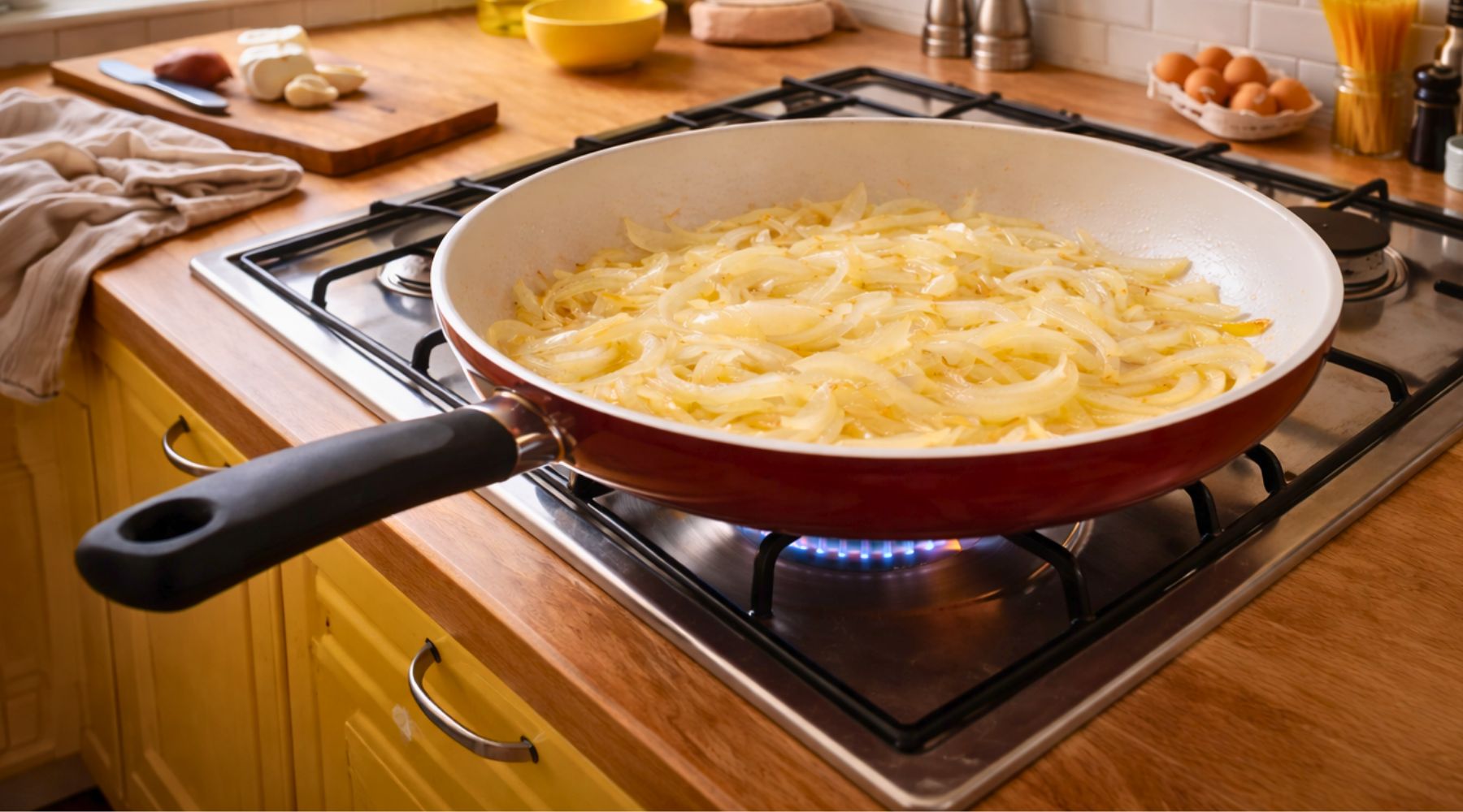 Onions turning translucent in a pan before browning